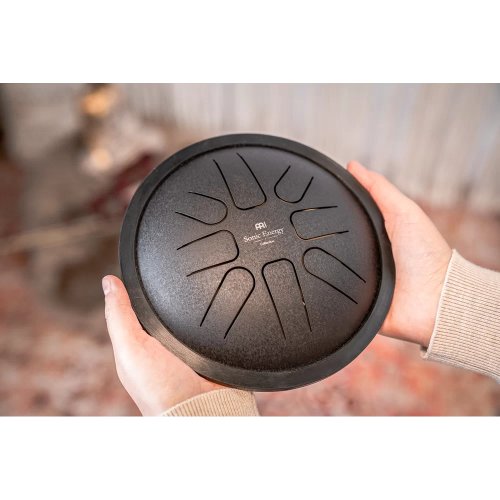 Meinl Sonic Energy Small Steel Tongue Drum Black F Minor 8 Notes 7in / 18 cm diameter - SSTD1BK_web_lifestyle_detail_01.jpg