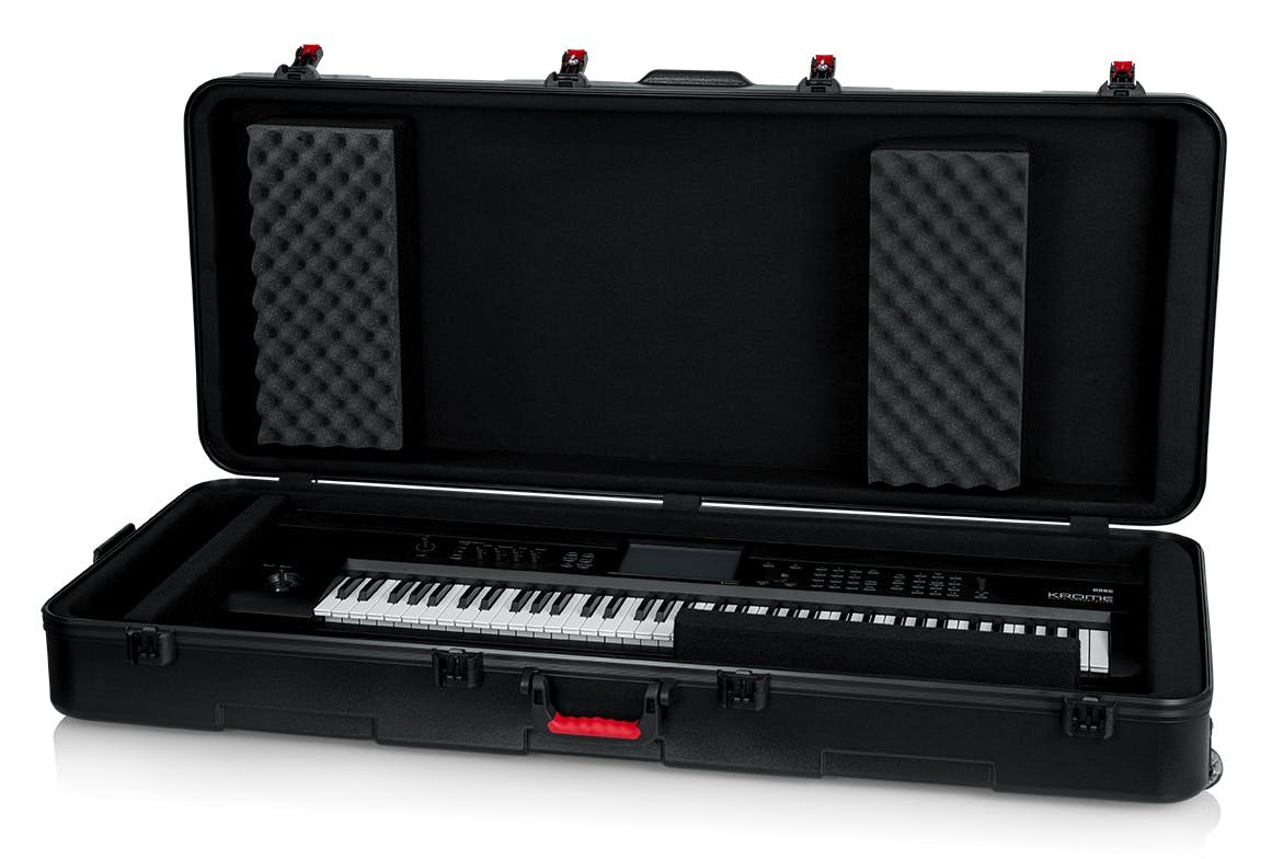 Gator TA Molded PE Keyboard Case with TSA Latches & Wheels for Extra Deep 76-note Keyboards - GTSAKEY76D-GTSA-KEY76D-Open-Gear.jpg
