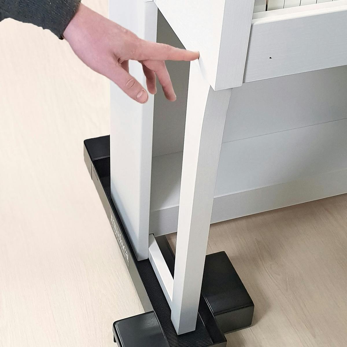 Musisca Glide Digital Piano Dollies - 313695-Pushing Piano SQUARE.jpg