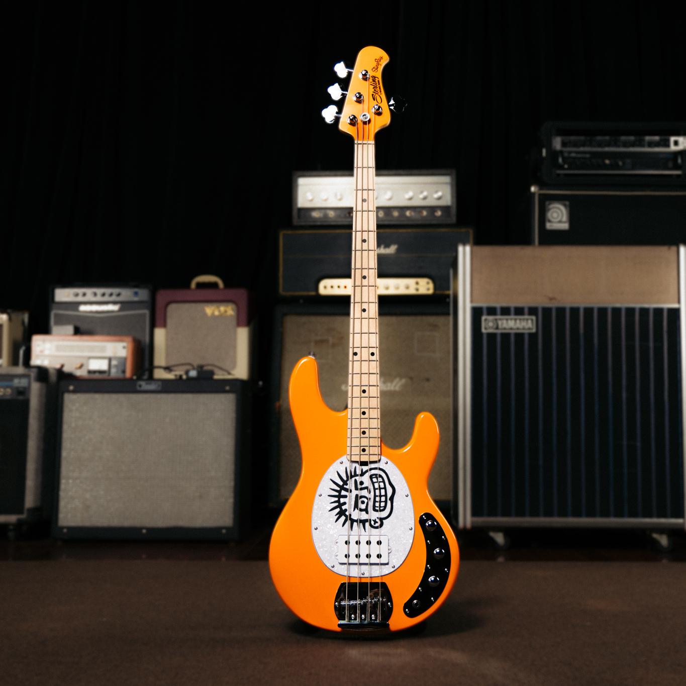 Sterling by Music Man Mike Herrera Signature Artist Series StingRay Bass Guitar in Orange Creamsicle - ST-HERRERA-OCR-M1-Sterling-by-Music-Man-Mike-Herrera-StingRay-Lifestyle.jpg