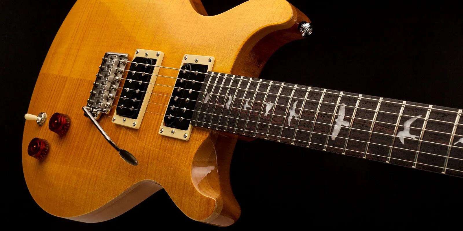PRS SE Santana Electric Guitar in Santana Yellow - SE-SASY-PRS-SE-Santana-Yellow-Lifestyle.jpg