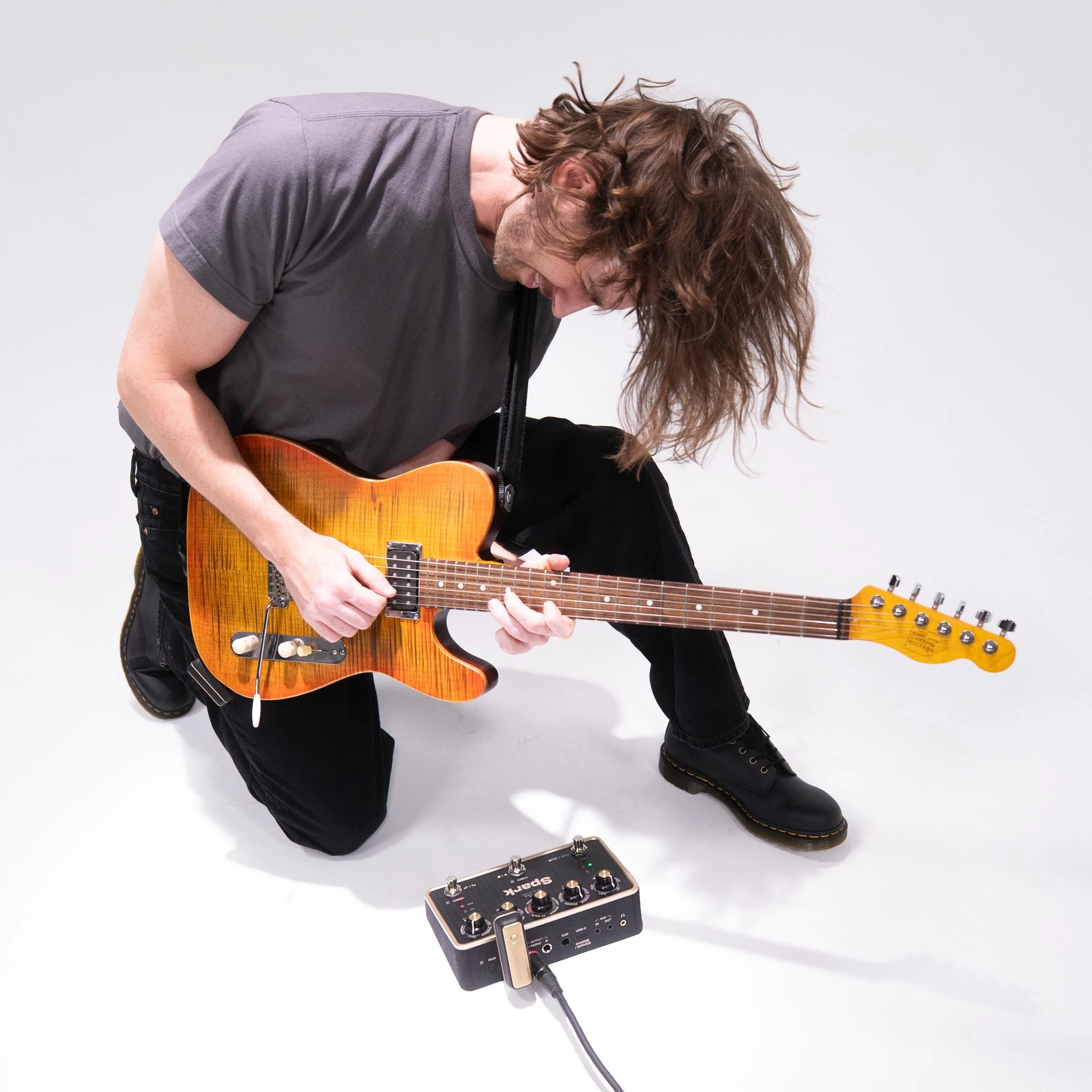 Positive Grid Spark PEDAL Smart Amp, Multi-FX & Looper - SPARK-PEDAL-Male-Guitarist.jpg