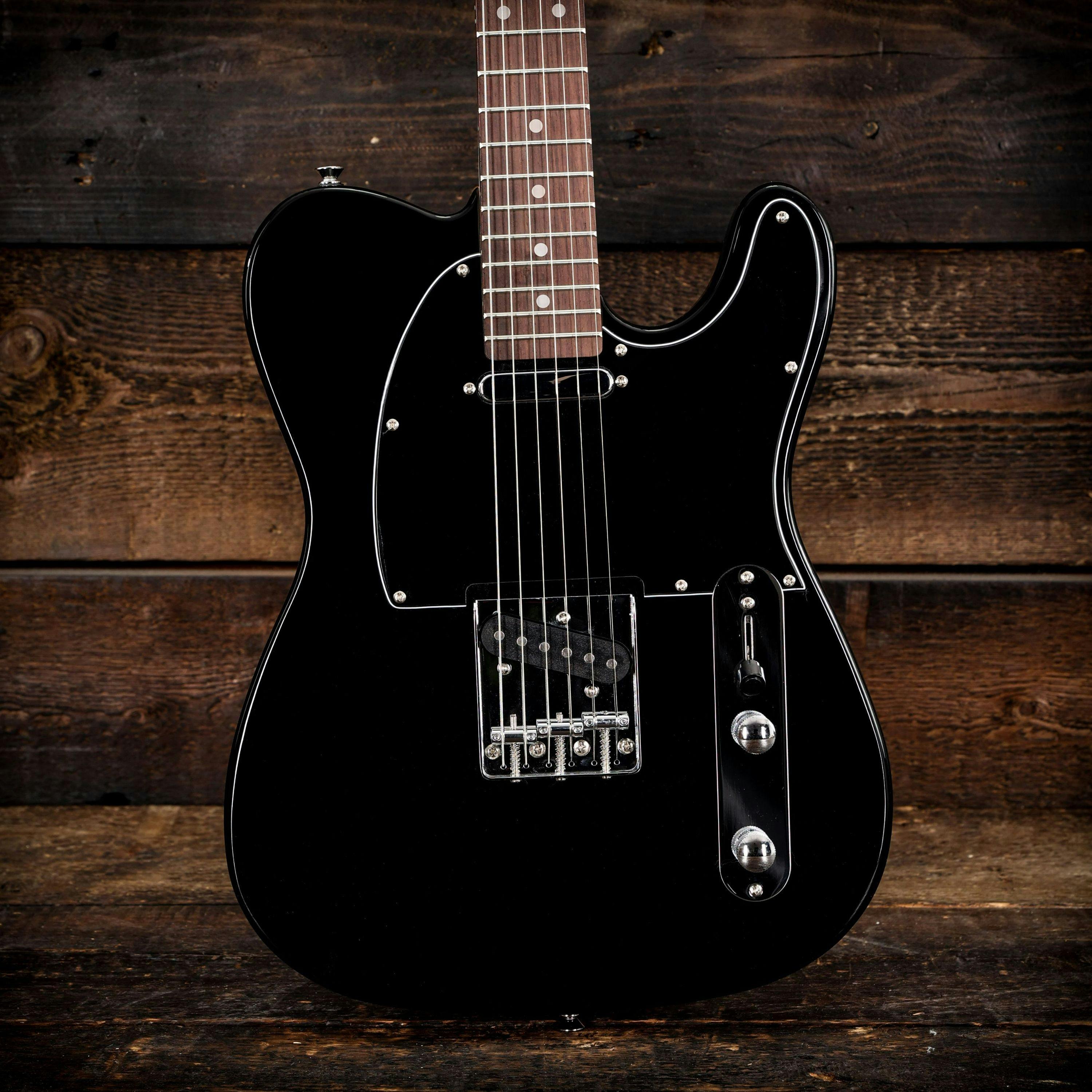 EastCoast T1 Electric Guitar in Black with Rosewood Fretboard - 479429-EastCoast T1 Electric Guitar in Black wood background.jpg