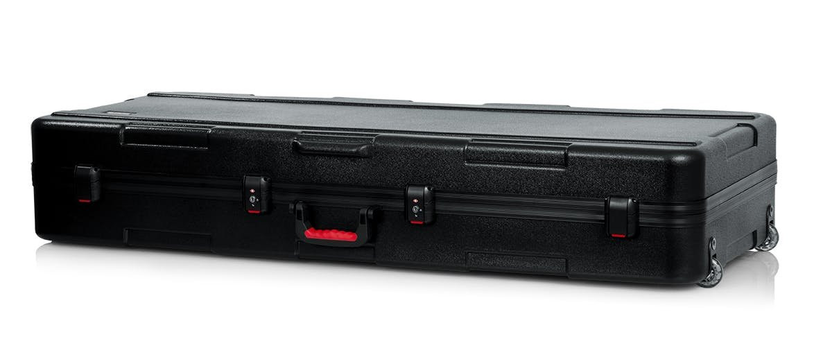 Gator TA Molded PE Keyboard Case with TSA Latches & Wheels for Extra Deep 76-note Keyboards Gator TA Molded PE Keyboard Case with TSA Latches & Wheels for Extra Deep 76-note Keyboards
