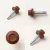 Various angles of the RoofingPro RS25 Roofing Screws - 25mm - RAL 8004 Copper Brown