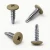 Various angles of the powder coated 19mm wafer head self drilling screw with a RAL 1020 olive yellow coloured screw head.