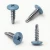 Various angles of the powder coated 19mm wafer head self drilling screw with RAL 5024 coloured screw head