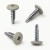 Various angles of the pebble grey coloured 19mm wafer head self drilling powder coated screws for metal.