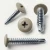Various angles of the coloured RAL 1020 grey beige wafer head self drilling screws