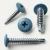 Various angles of the pastel blue wafer head self drilling screws for metal work and framing