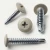 Various angles of the pebble grey wafer head drill point screws for metal work.