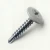 A 25mm x 4.2mm Painted Wafer Head Self drilling Screws - BZP Steel with a RAL 7035 Light Grey powder coated coloured screw head.