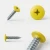 Various angles of the sulphur yellow coloured powder coated flange head screw