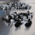 A small pile of PanelPro™ HP19 Hoarding Screw - 19mm - RAL 9005 Jet Black Screws