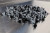 A large pile of PanelPro™ HP19 Hoarding Screw - 19mm - RAL 9005 Jet Black Fixings