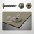 Various angles of this beige grey powder coated coloured hoarding screw, including one in a colour matched hoarding panel.