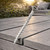 DeckingPro DS56 RAL 7042 Traffic Grey colour matched composite decking screw shown on stone grey composite decking boards outdoor