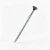 DeckingPro DS65 RAL 8028 Terra Brown colour matched composite decking screw shown on coffee composite decking boards outdoor