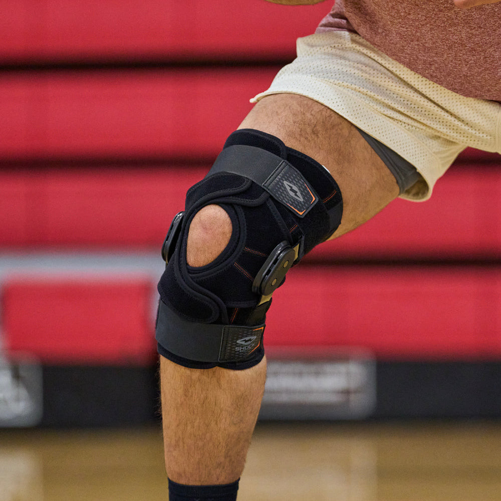 Shock Doctor Knee Brace with Dual Wrap & Heavy-Duty Hinges