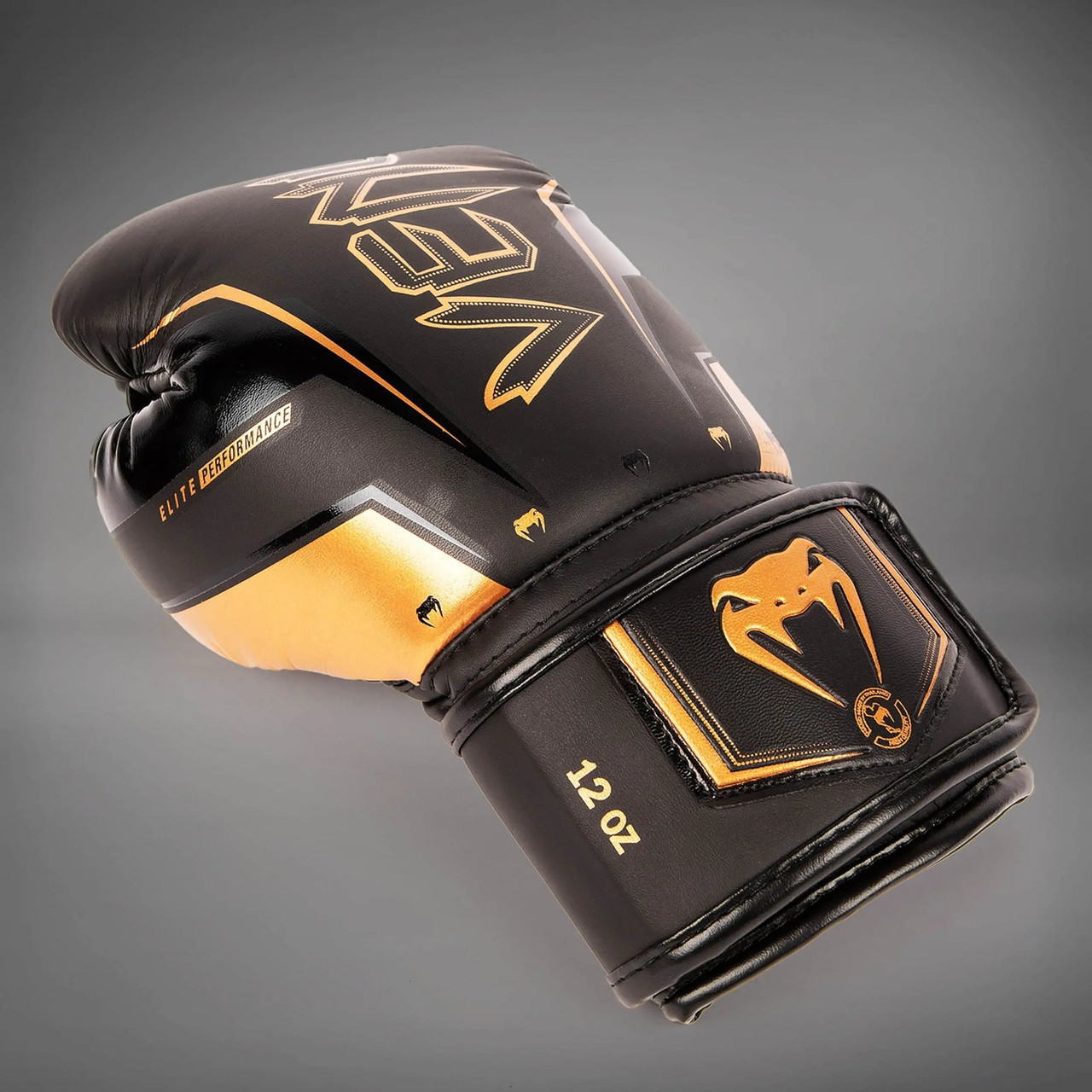 Venum Elite Evo Boxing Gloves - Black/Bronze
