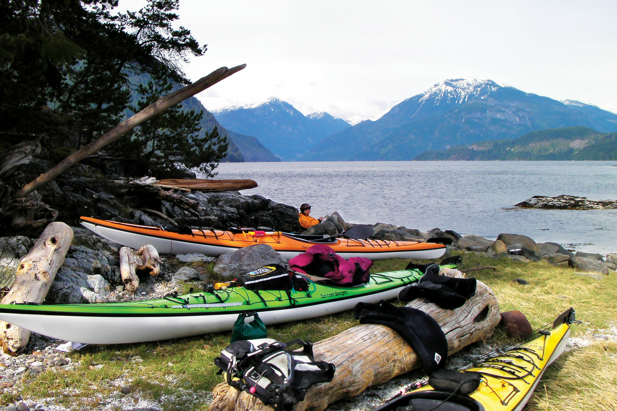 Solstice GT Touring Kayaks On A Shoreline