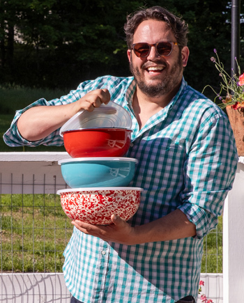 Dan Pelosi holding enamelware mixing bowl set outdoors