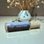 A single, 10 ml roller bottle of perfume oil from moccasin bend soap company in the scent Coconut Vanilla.