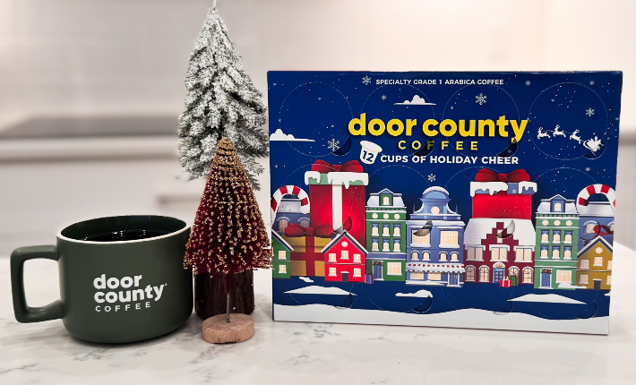 A festive decorated box revealing holiday inspired coffee flavors
