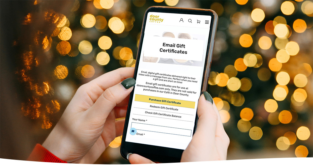 a smartphone opened to door county coffee website gift certificates page