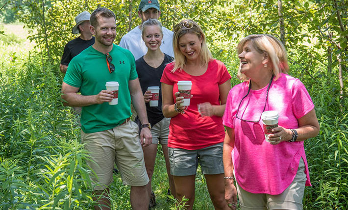 Photo of adult Wilson family with spouses on nature walk