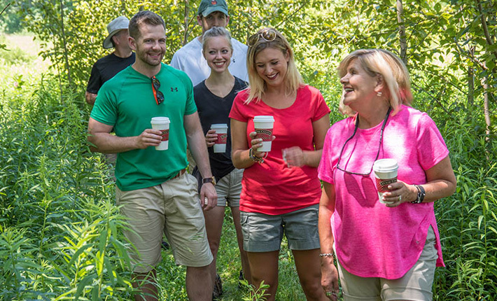 Photo of adult Wilson family with spouses on nature walk