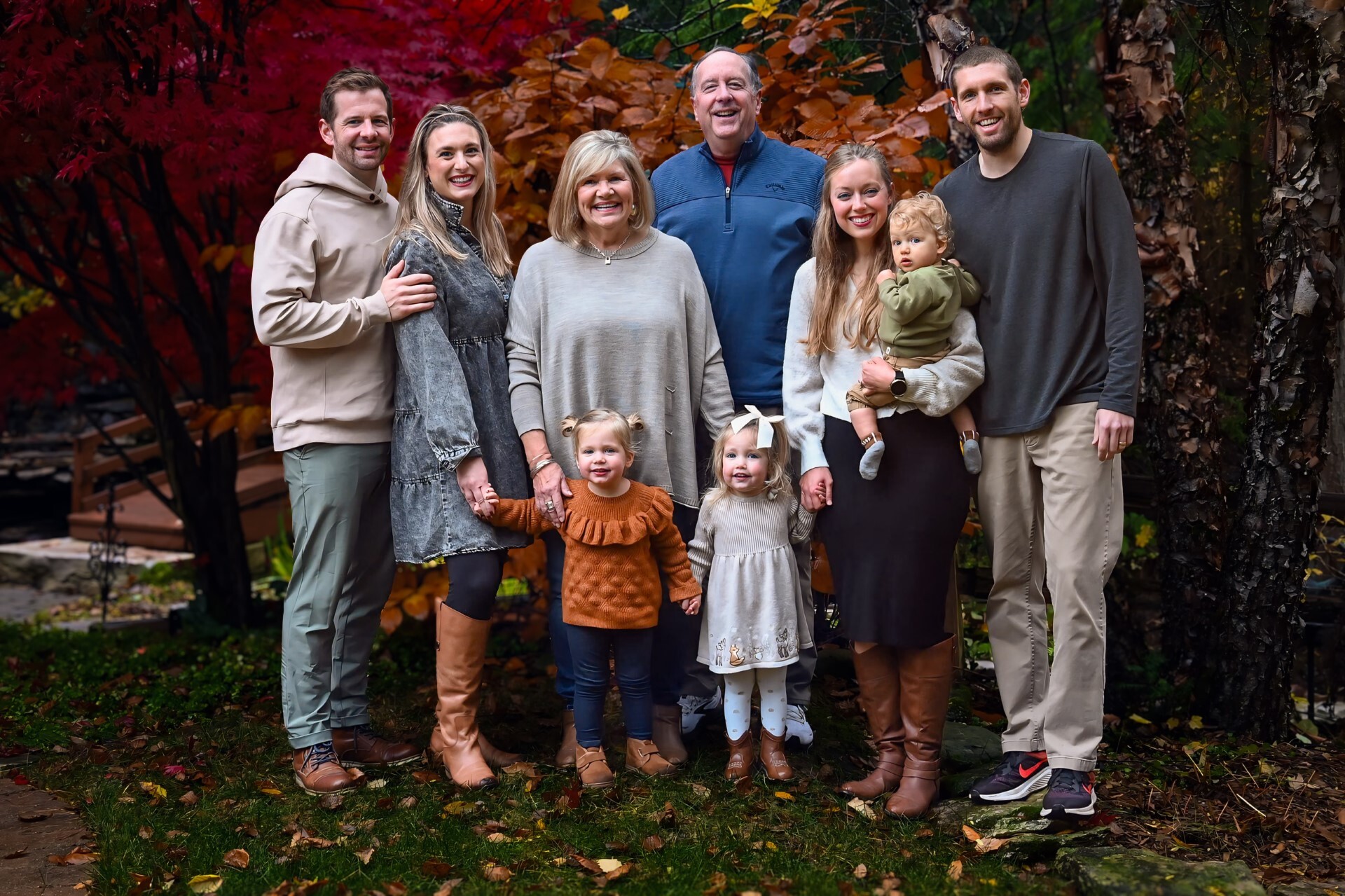 The Wilson family in front of pine trees