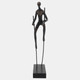 16604#Resin, 15"h  Man On Stilts, Bronze