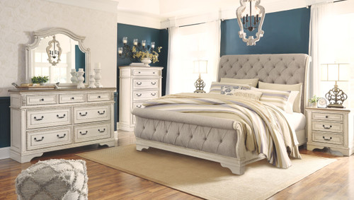 Realyn - 7 Pc. - Dresser, Mirror, King Upholstered Sleigh Bed, 2 Nightstands - Two-tone