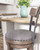 Caitbrook - Tall UPH Swivel Barstool - Gray