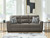 Olten - 4 Pc. - Sofa, Loveseat, Chair And A Half, Ottoman - Graphite