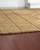 Luzmont - 9' x 12' Rug - Golden Brown