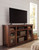 Harpan Reddish Brown Xl TV Stand W/Fireplace Option