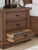 Taffenbrook - Three Drawer Night Stand - Medium Brown