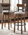 Valebeck - Tall UPH Swivel Barstool - Brown