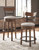 Valebeck - Tall UPH Swivel Barstool - Brown