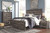 Wynnlow - 5 Pc. - King Crossbuck Panel Bed, 2 Nightstands - Gray