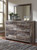 Derekson - Queen Panel Bed With 4 Storage Drawers - 9 Pc. - Dresser, Mirror, King Bed, 2 Nightstands - Multi Gray
