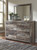 Derekson - 6 Pc. - King Panel Headboard with Bolt on Bed Frame, Dresser, Mirror, Chest, Nightstand - Multi Gray