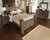 Juararo - 7 Pc. - Dresser, Mirror, King Poster Bed, 2 Nightstands - Dark Brown