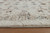 Jossler - 5' x 7' Rug - Ivory / Brown / Teal