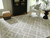 Unawick - 8' x 10' Rug - Gray / Ivory