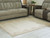 Emorymore - 5' x 7' Rug - Brown / Beige
