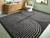 Eldonmore - 8' x 10' Rug - Black / Ivory