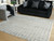 Turinwith - 8' x 10' Rug - Ivory / Black